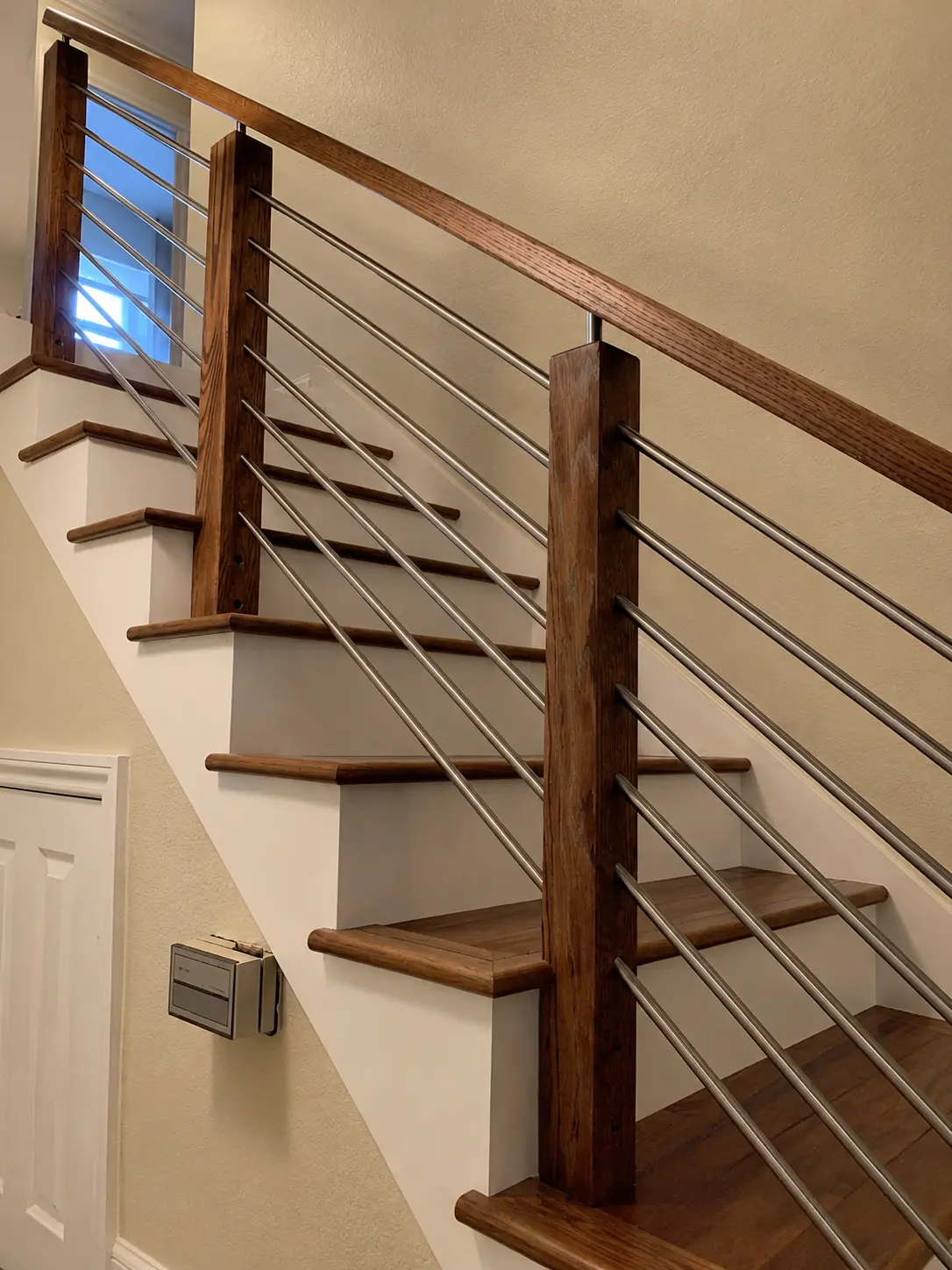 Oak & Stainless Stair Rail — Whole Home Renovations by Arnold Barrera Construction